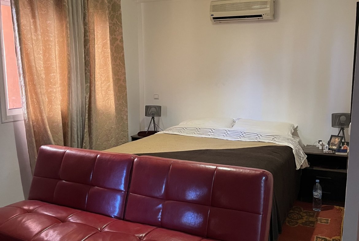 À Vendre : Bel Appartement avec Terrasse et Place de Parking à Majorelle, Marrakech